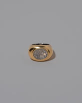 Vintage Moonstone Demeter Intaglio Ring on light color background.