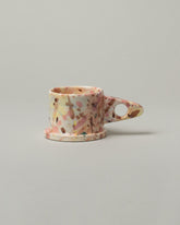 Echo Park Pottery by Peter Shire Triangle Handle Dusty Rose Splatter Mug on light color background.