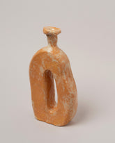 Closeup details of the Willem van Hooff Copper Tiny Core Vessel on light color background.