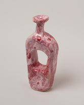 Closeup details of the Willem van Hooff Rose Tiny Core Vessel on light color background.