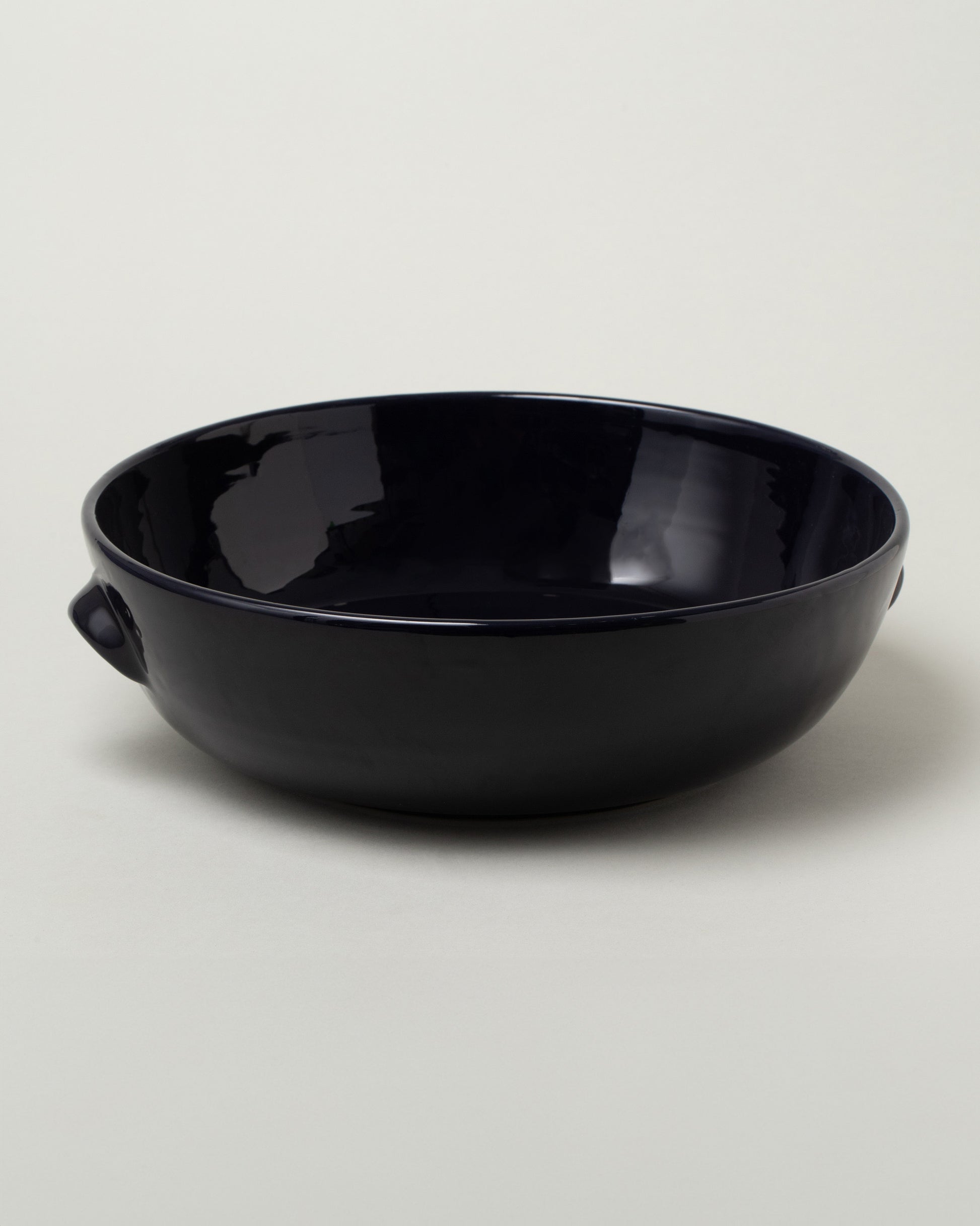 La Ceramica Vincenzo Del Monaco Midnight Large Salad Bowl on light color background.