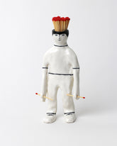 Eleonor Boström Standing PARK Matchstick Guy on light color background.