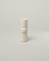 Bonam Kim White Lip Pillar Vase on light color background.