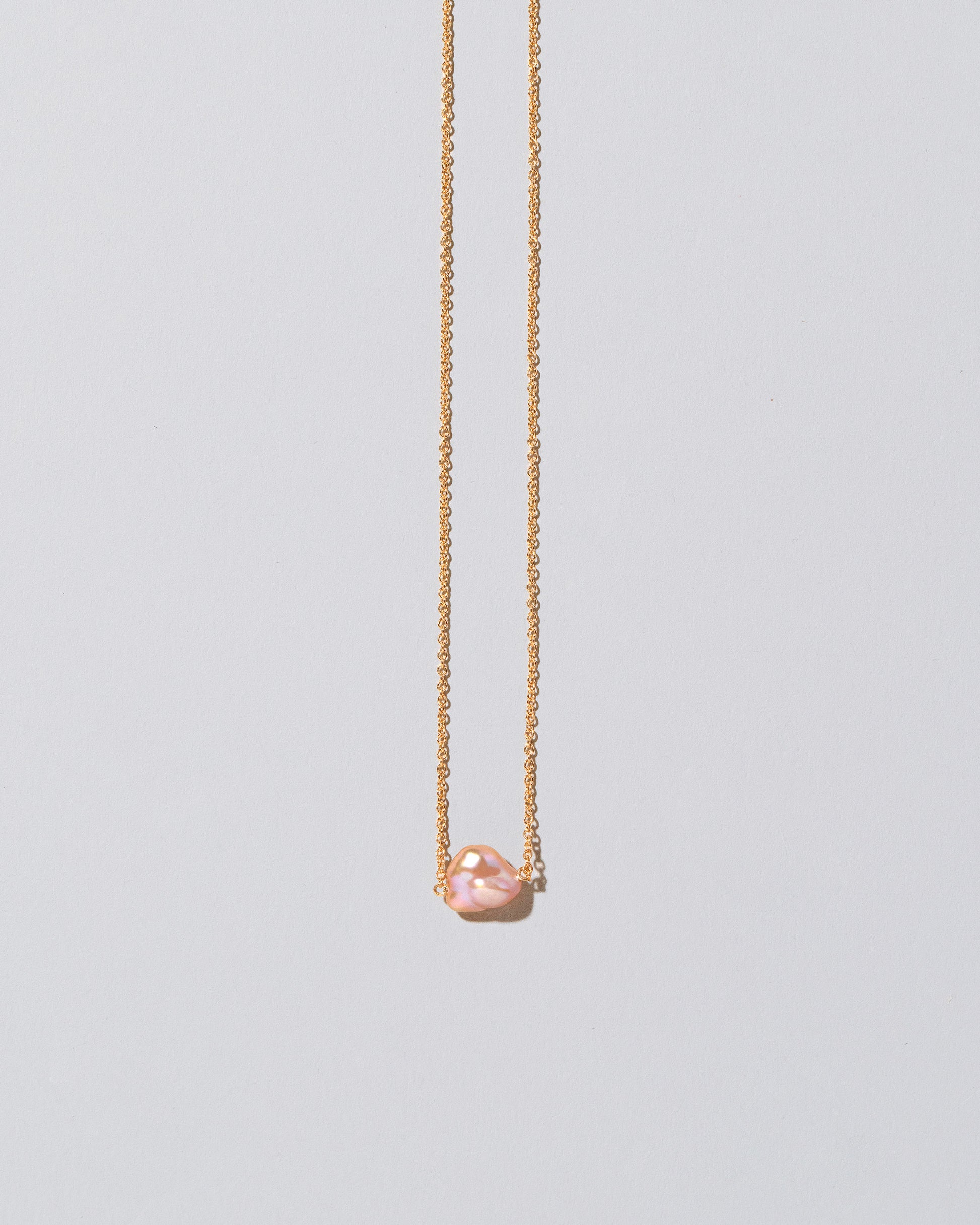 Lagniappe Pearl Necklace Pink #4 on light color background.