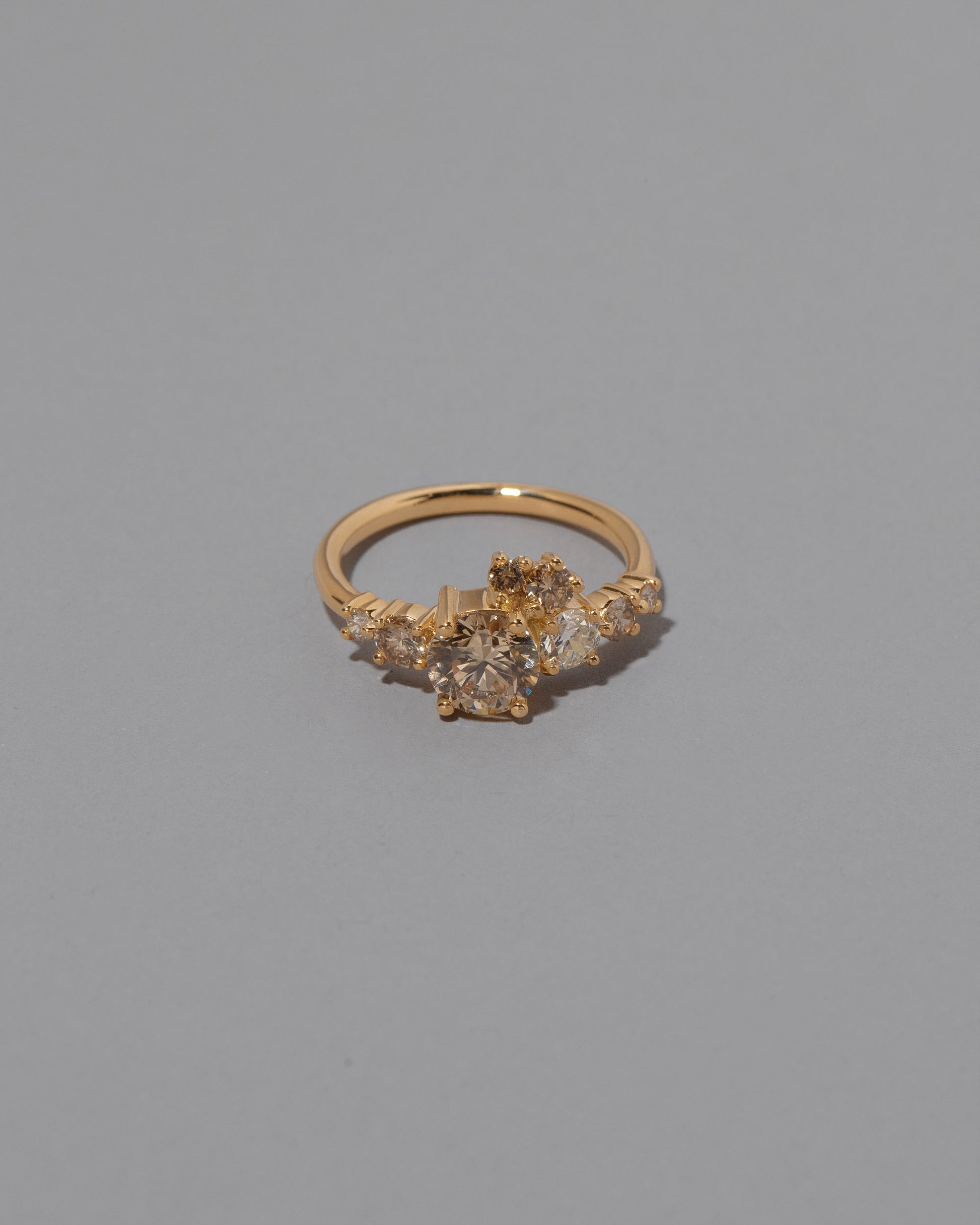 Champagne Diamond Luna Ring on grey color background.