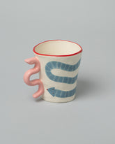 Laetitia Rouget Sneaky Mug in Blue on light color background.
