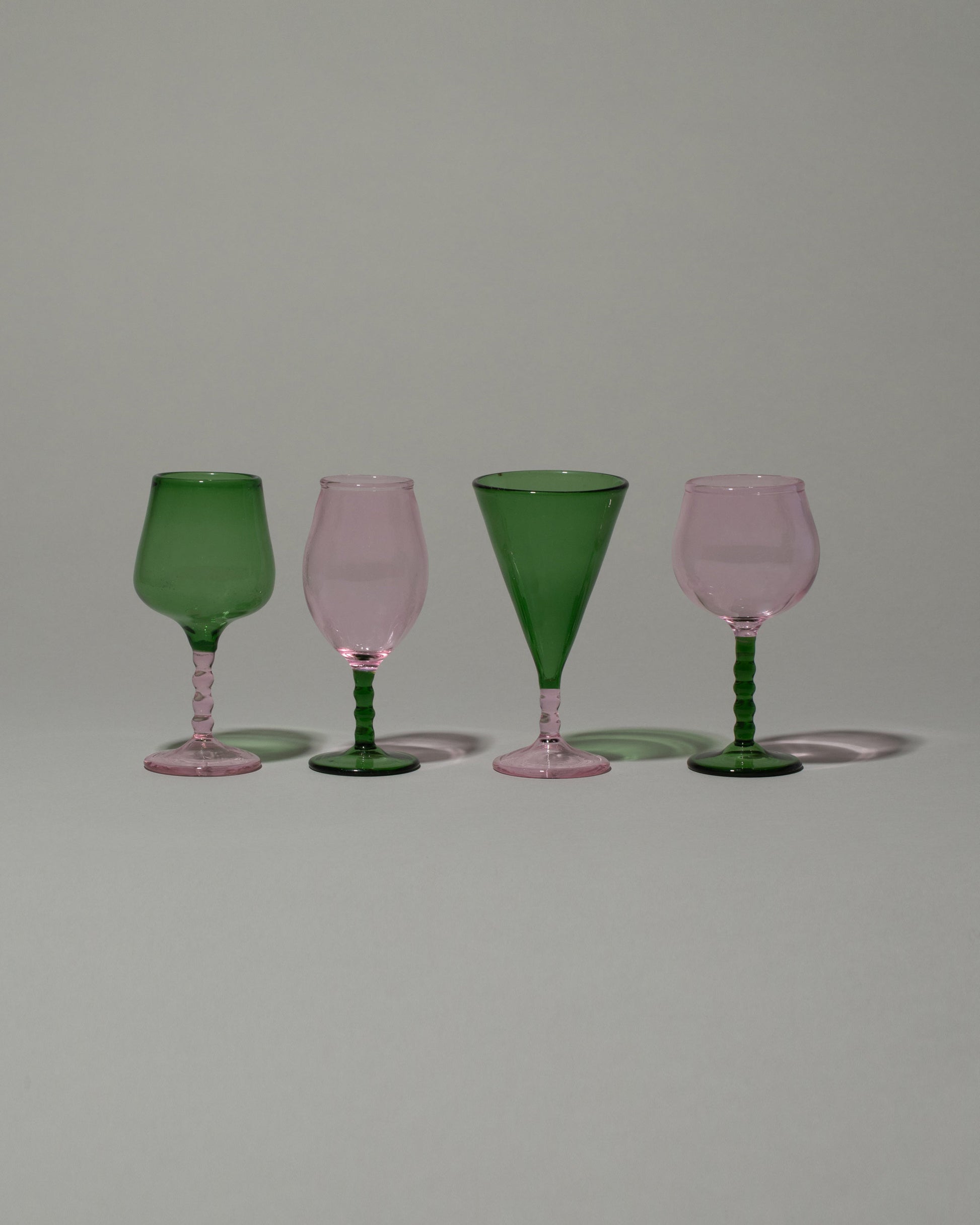 Ornamental by Lameice Pink & Green Dreamlike Liquor Glass Set on light color background.