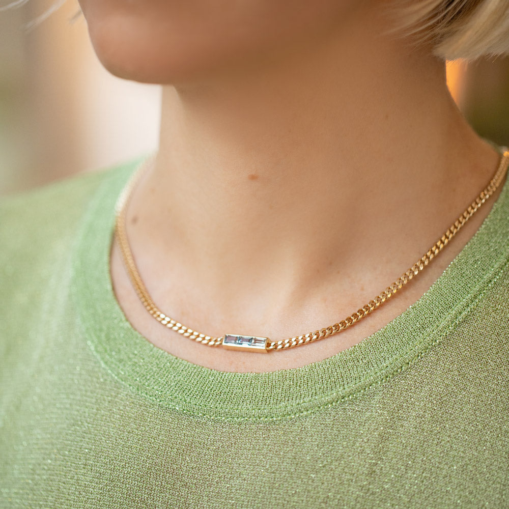 product_details::Bond Necklace on model.