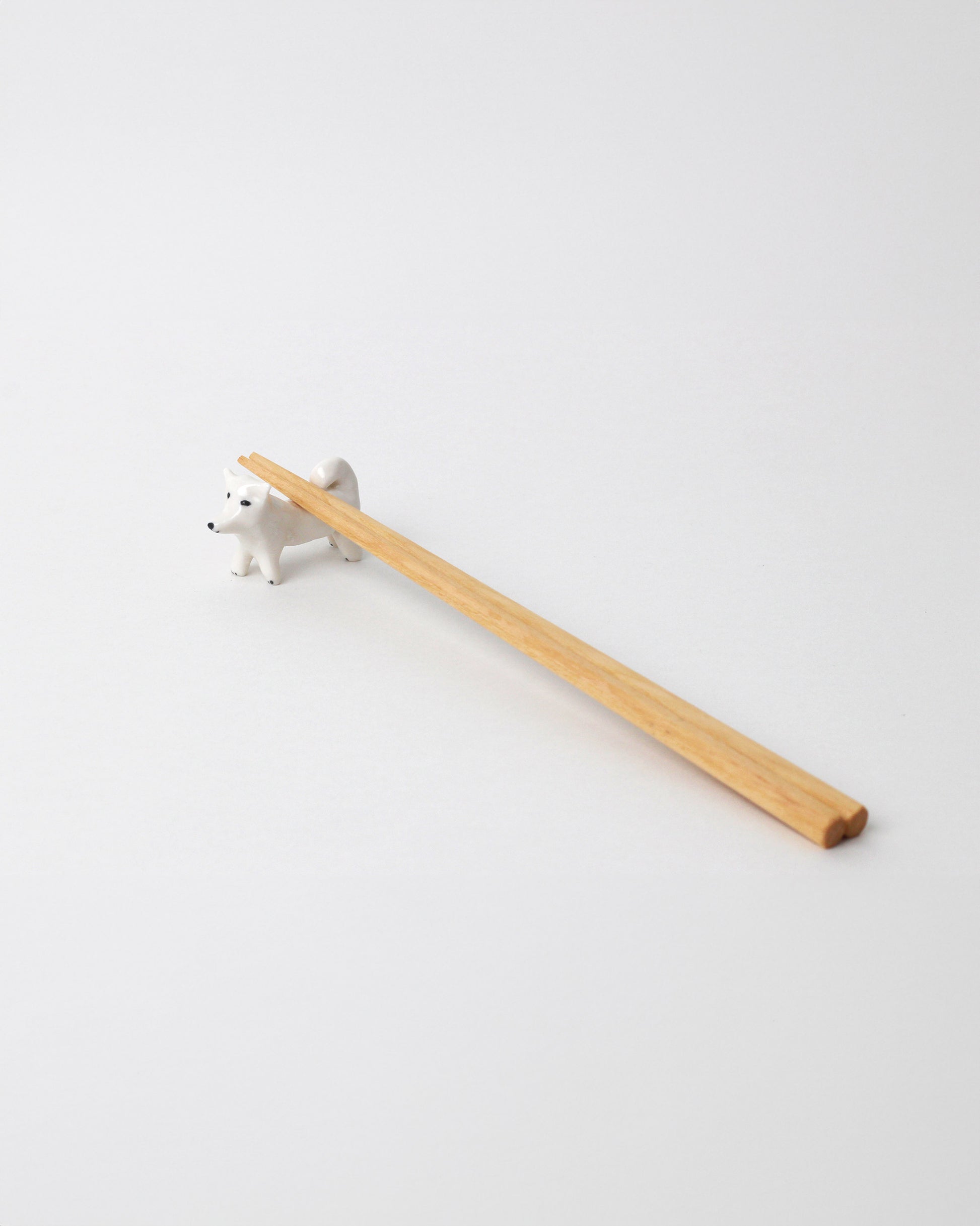 Eleonor Boström Samoyed PARK Chopstick Dog Rest on light color background. Chopsticks not included.