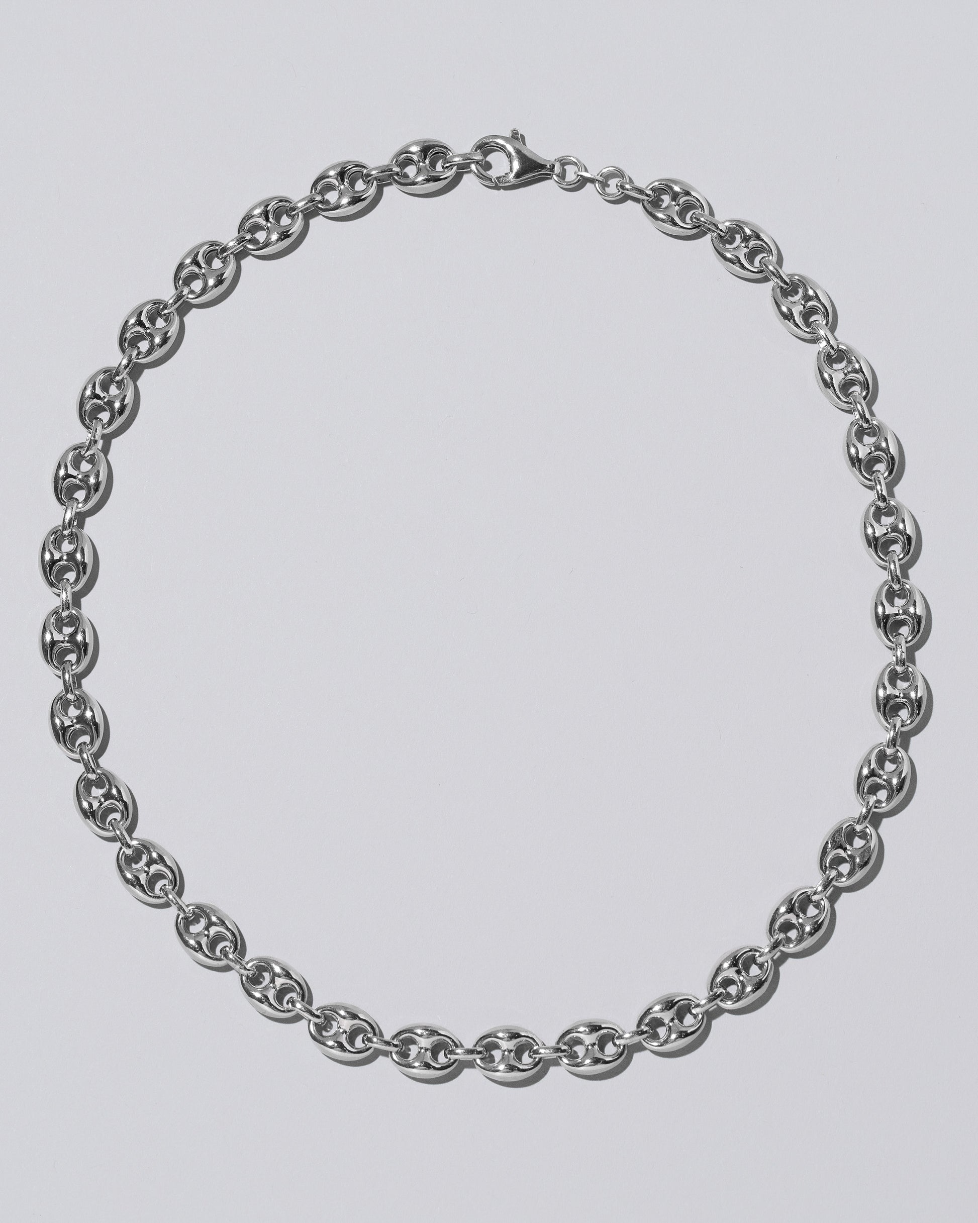 9.2mm Silver Puffed Mariner Chain on light color background.