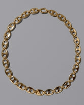 CRZM 22k Gold Yuba Medium Necklace on light color background.