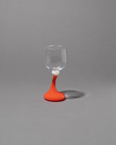 Helle Mardahl Bon Bon Wine Glass on grey color background.