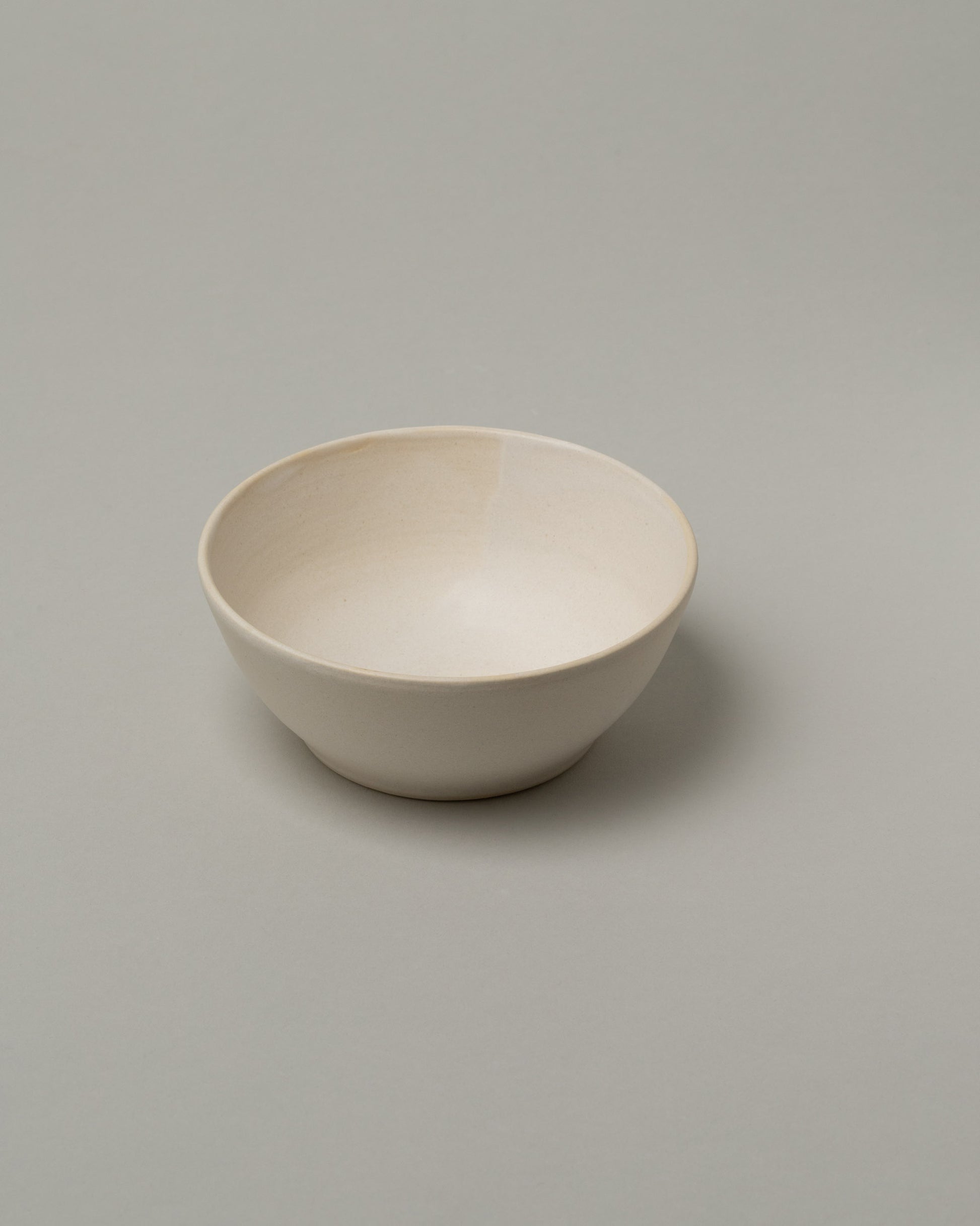 Tracie Hervy Small Bowl on light color background.