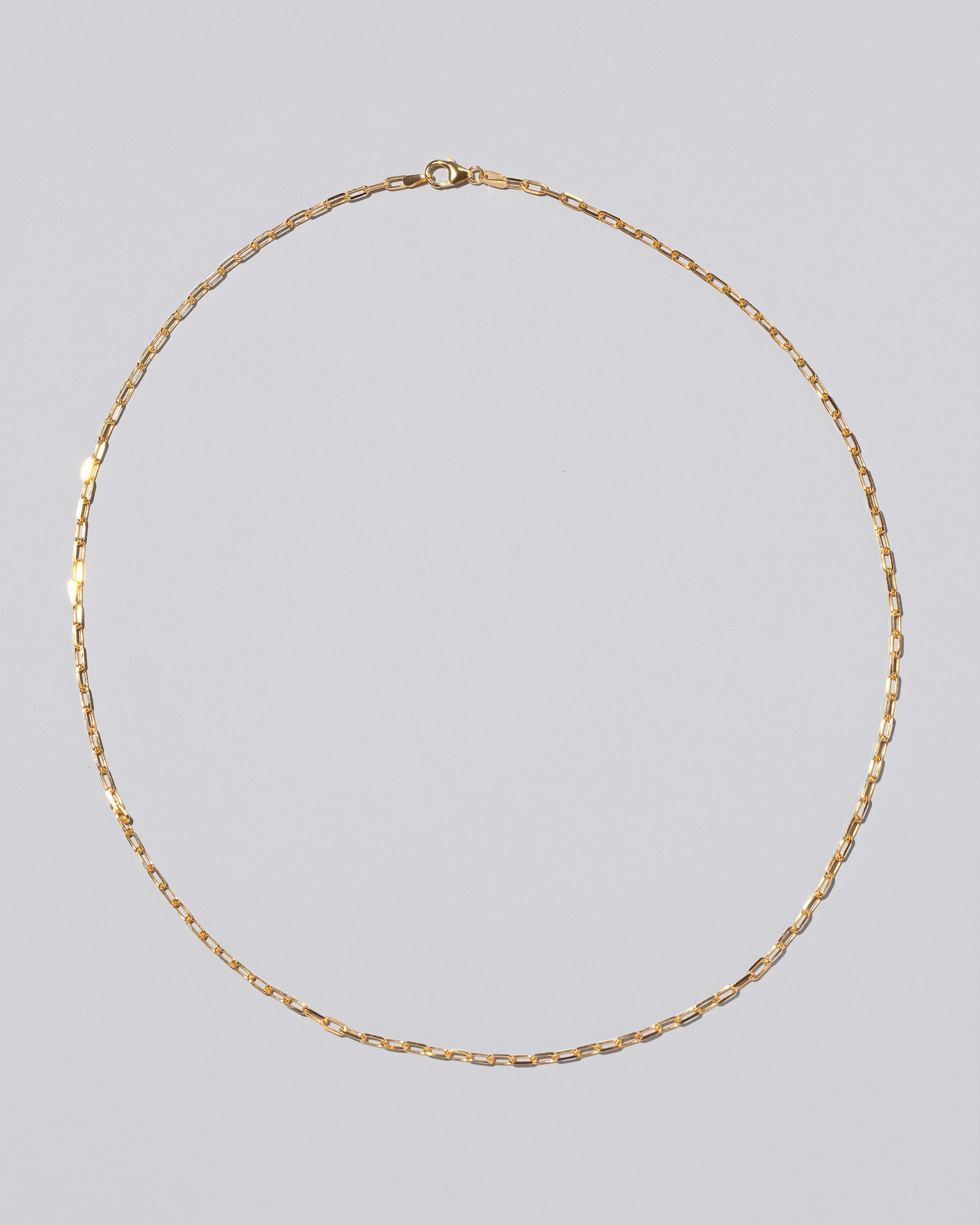2.2mm Lightweight Beveled Oval Chain Necklace on light color background.
