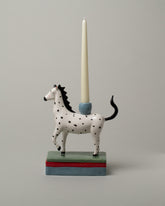 Detail view of the Laetitia Rouget Jose Stripe Zebra Candle Holder on light color background.