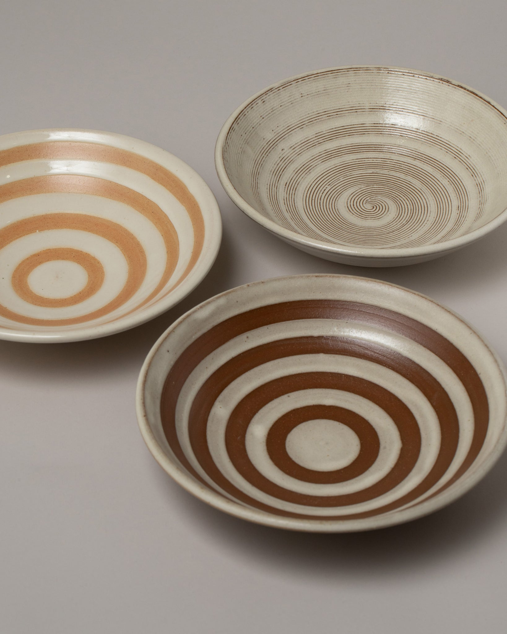 Closeup details of the Jeremy Ayers Shallow Bowls on light color background.