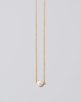 Lagniappe Pearl Necklace White #1 on light color background.