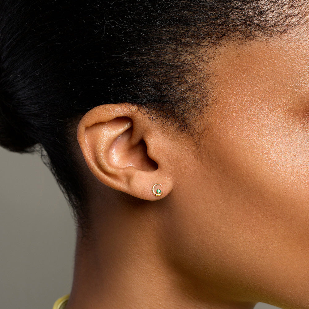 product_details::Gold Emerald Moon Ray Stud Earring Single on model.