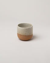 Humble Ceramics Sandstone & Snow White Large Alder Tumbler on light color background.