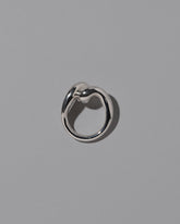 View from the side of the CRZM Sterling Silver Landform Ring on light color background.
