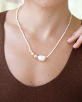 Tethys Pearl Necklace on model.