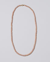 Freshwater Pearl Necklace on light color background.
