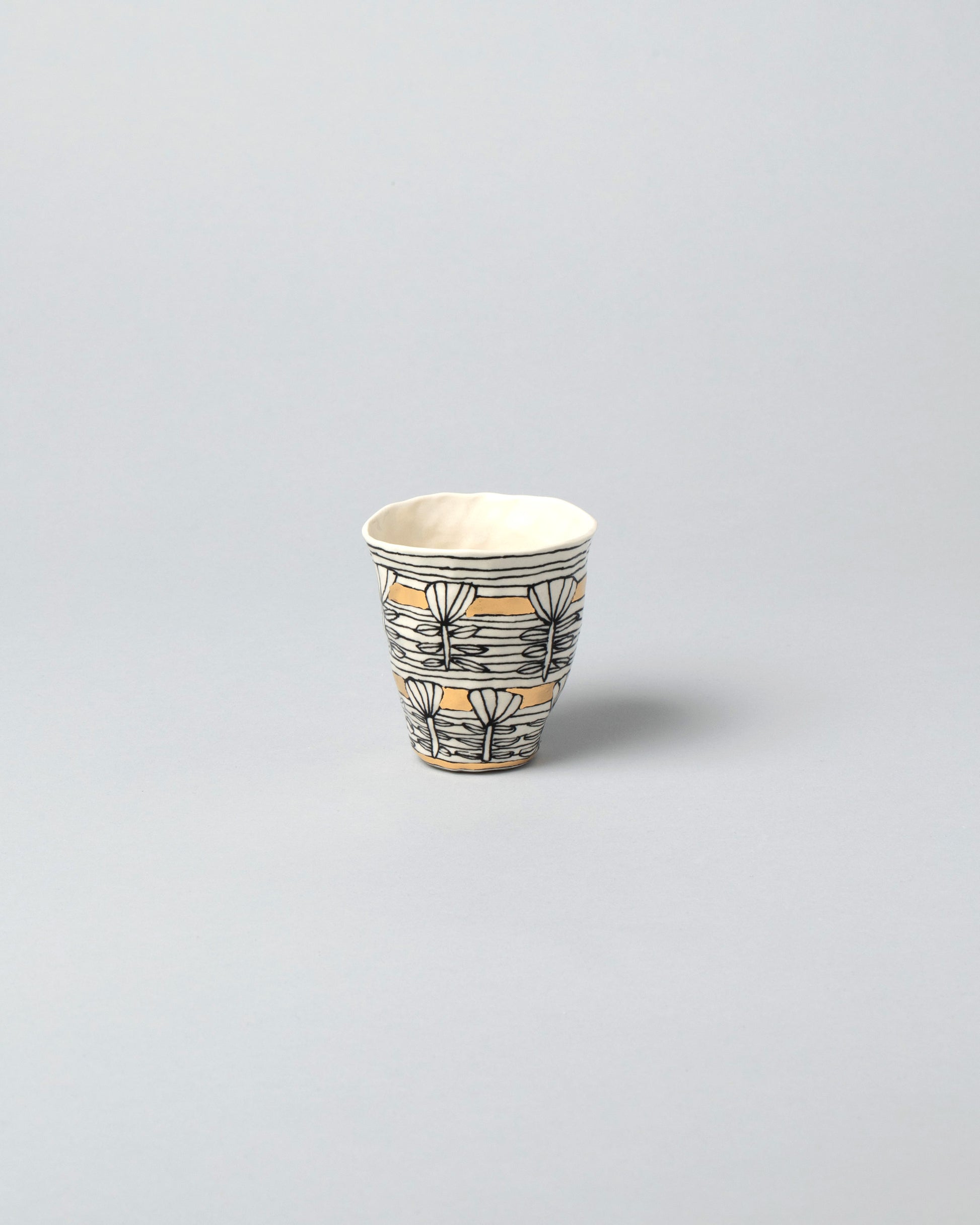 Suzanne Sullivan One Gaia Tumbler on light color background.