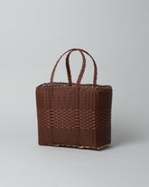 Palorosa Small Chocolate Lace Tote Basket Bag on light color background.