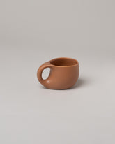 Dust and Form Small Maple Comfort Mug on light color background.