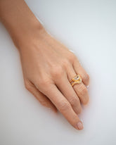 Gold Equate Band and Lined Up Ring on model.