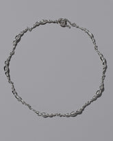CRZM Sterling Silver Foothill Necklace on light color background.