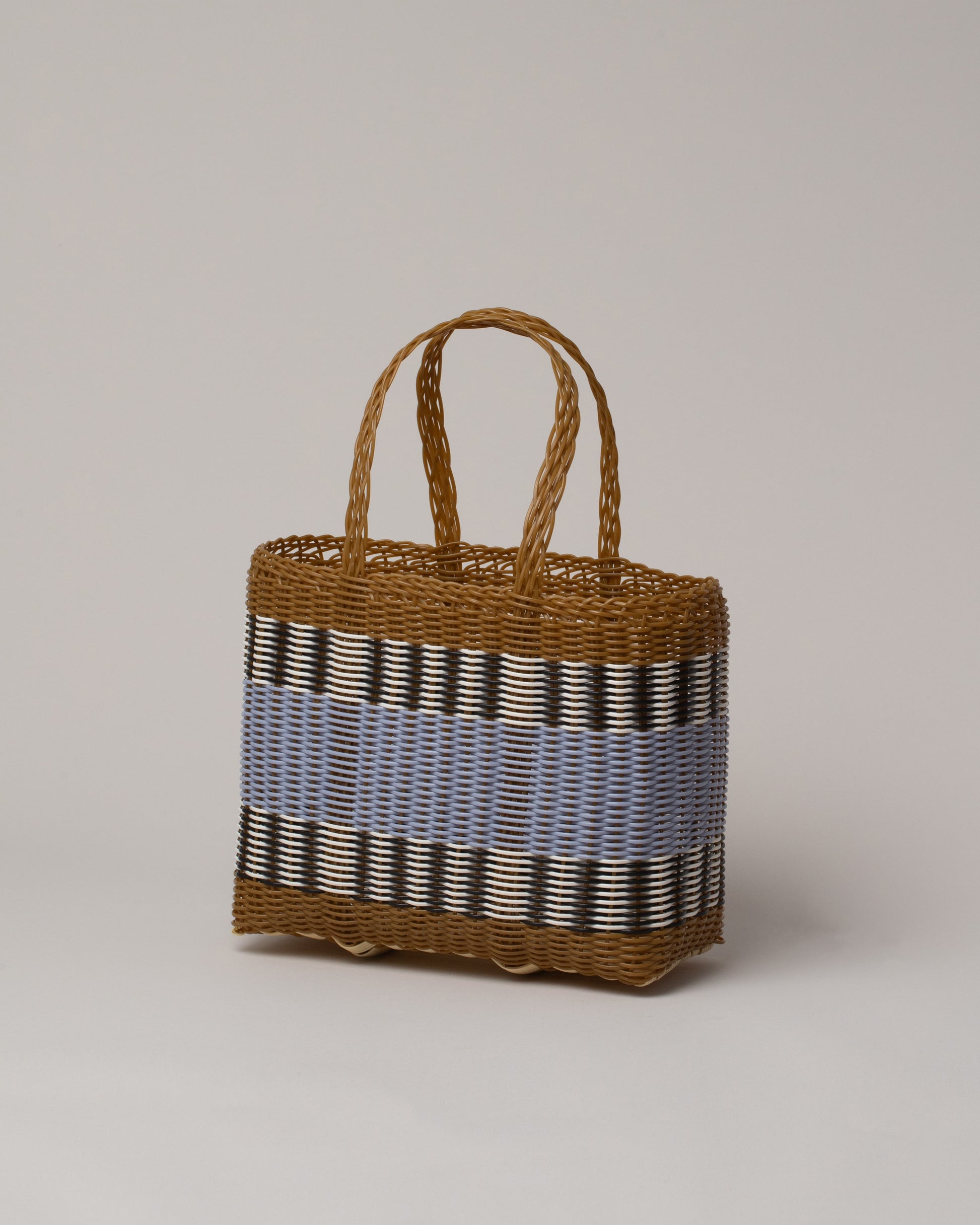 Palorosa Tobacco & Blue Lilac Small Handwoven Mercado Basket Bag on light color background.