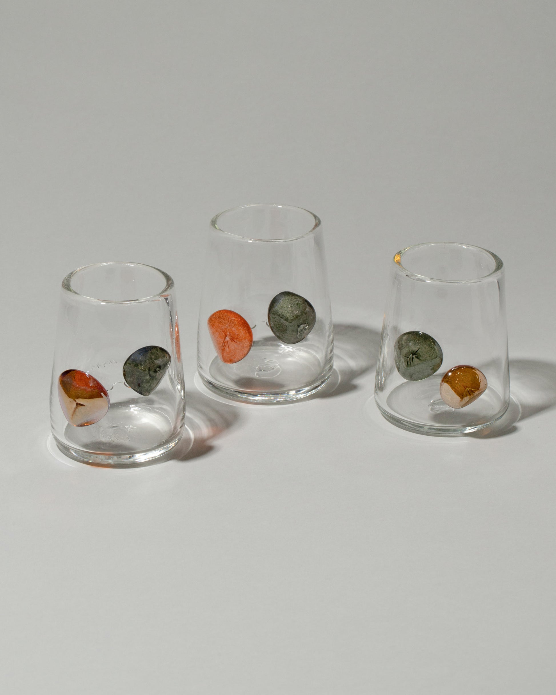 Group of Jess Humphrey Studio Petite Rocks Glasses on light color background.