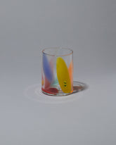 Bow Glassworks Smiley Splash Cup on light color background.