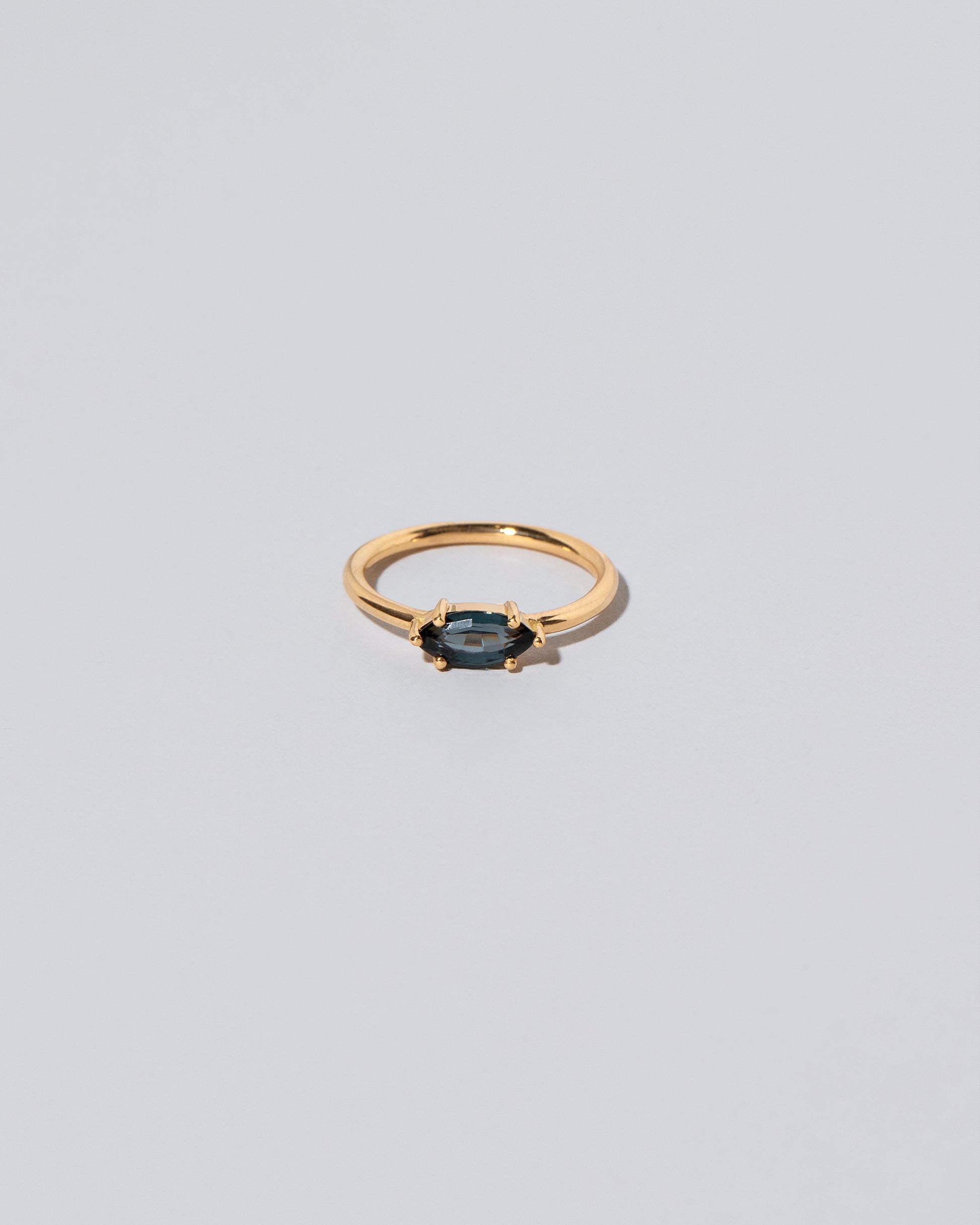 Deep Blue Ouvert Ring on light color background.