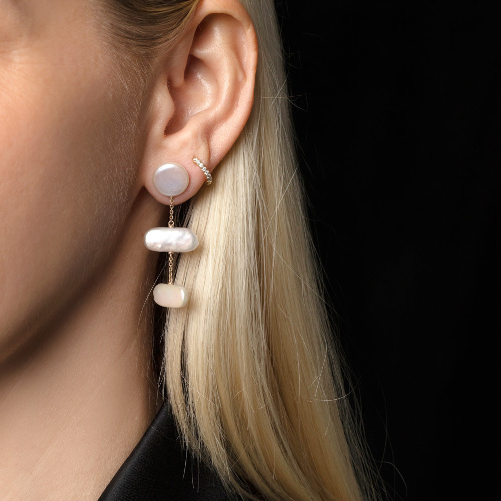 product_details::Kittiwake Earrings on model.