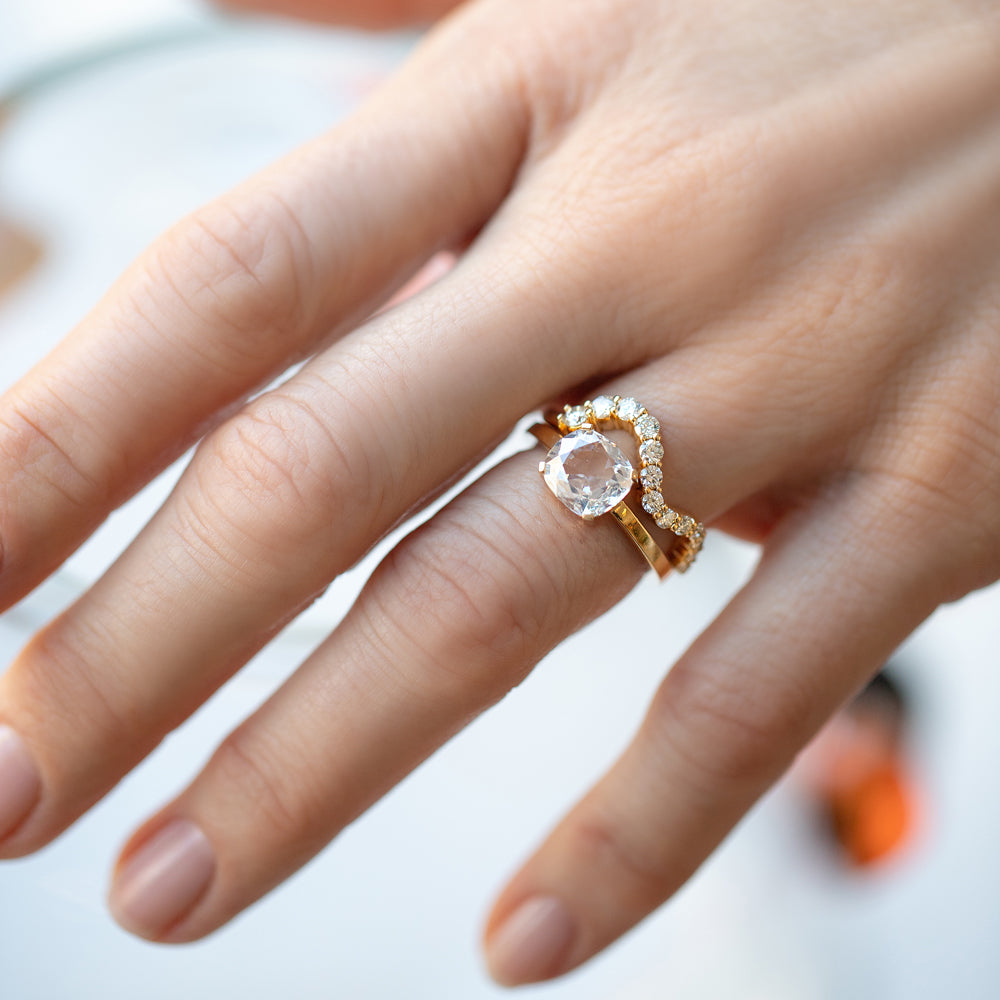 product_details::Transfiguration Ring and Gold White Diamond High Tide Band on model.