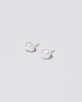  Lagniappe Pearl Stud Earrings on light color background.