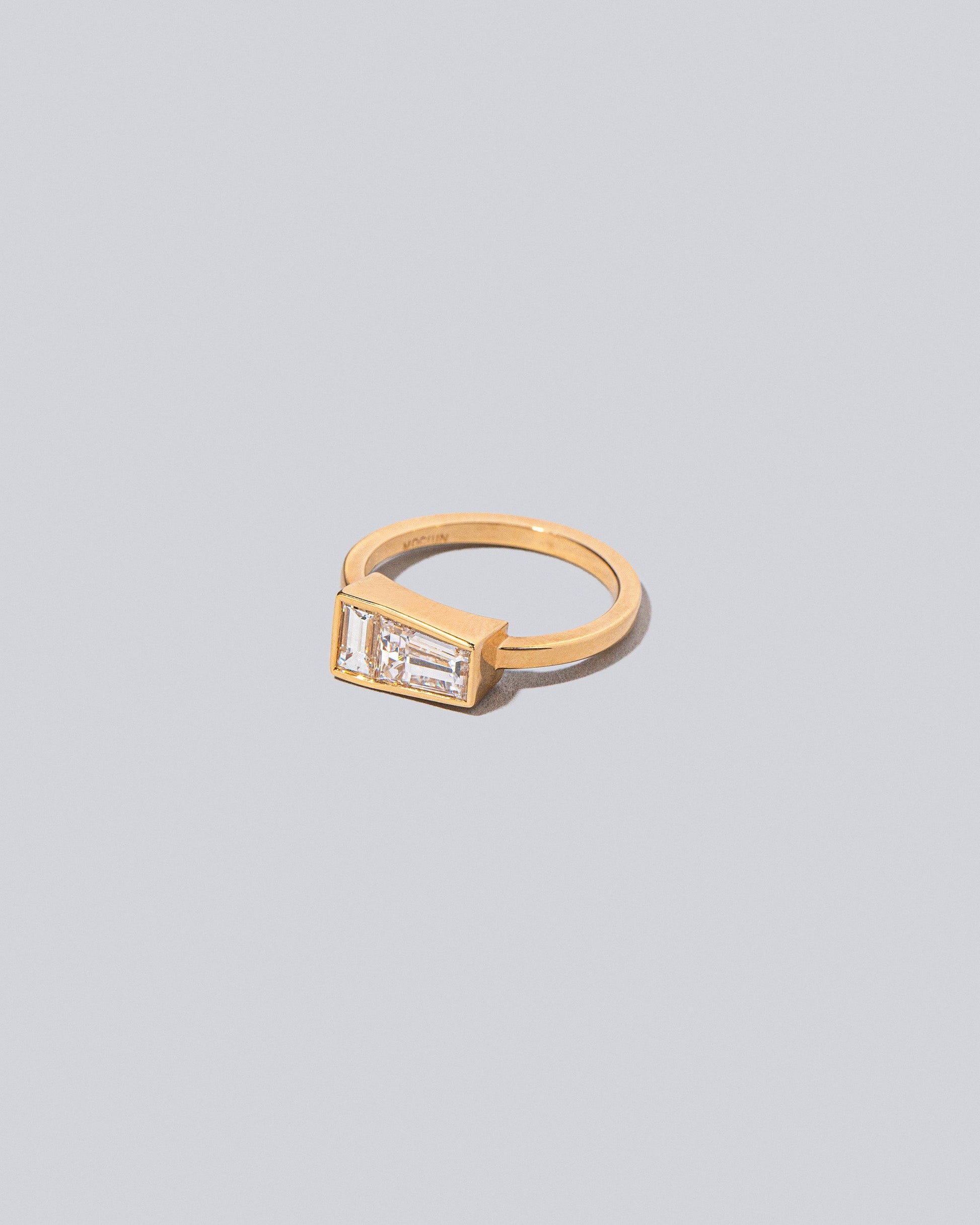 Product photo of the Ode Ring on light light color background.