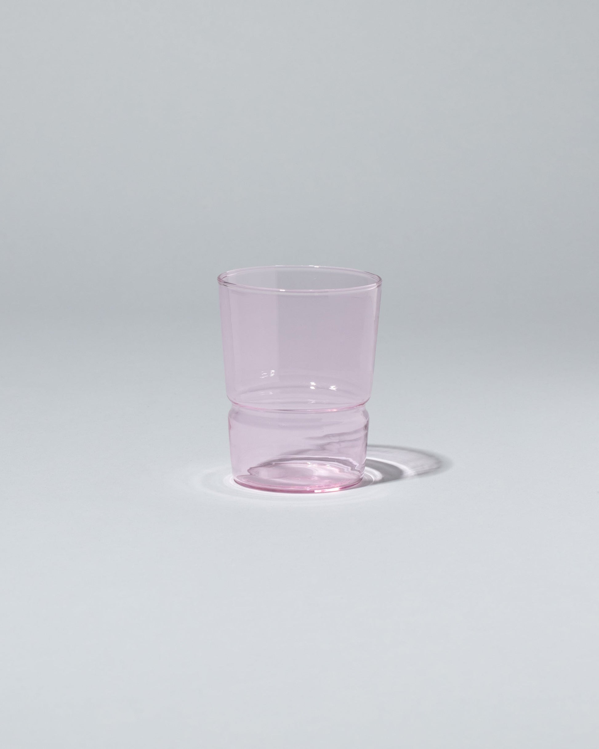 Ichendorf Milano Pink TAP Glass on light color background.