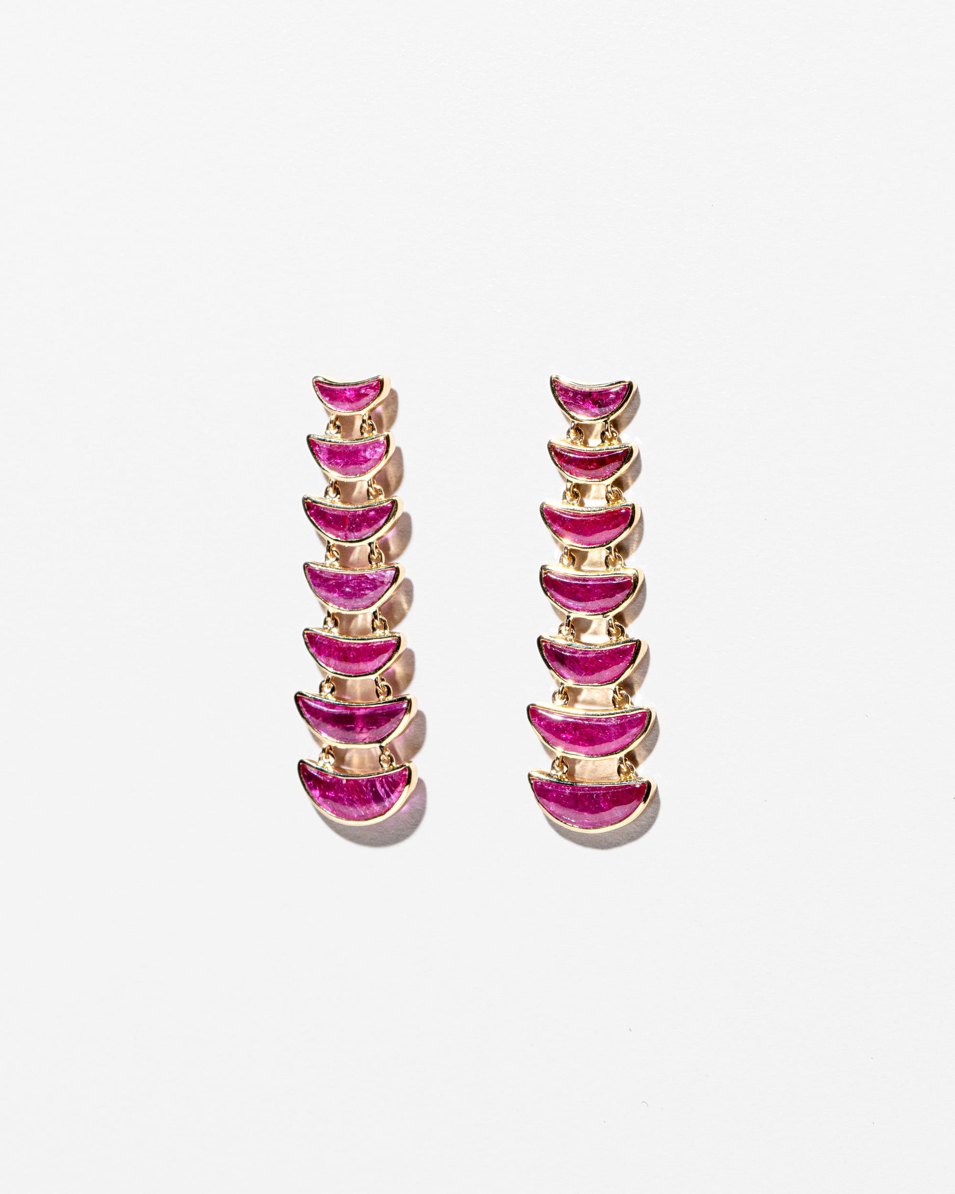  Flame Earrings on light color background.