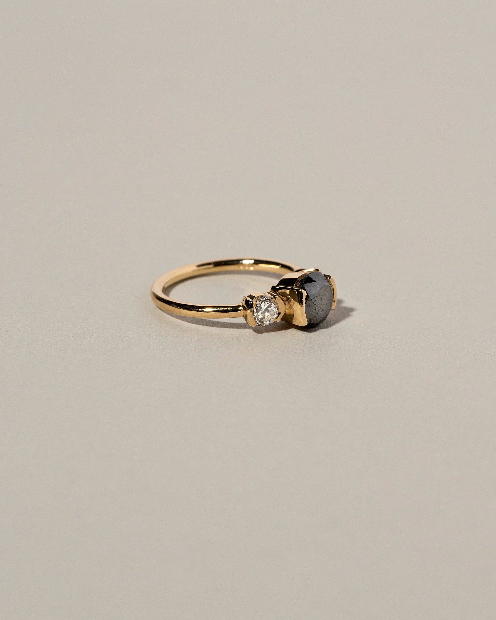  Black and White Diamond Ring on light color background.
