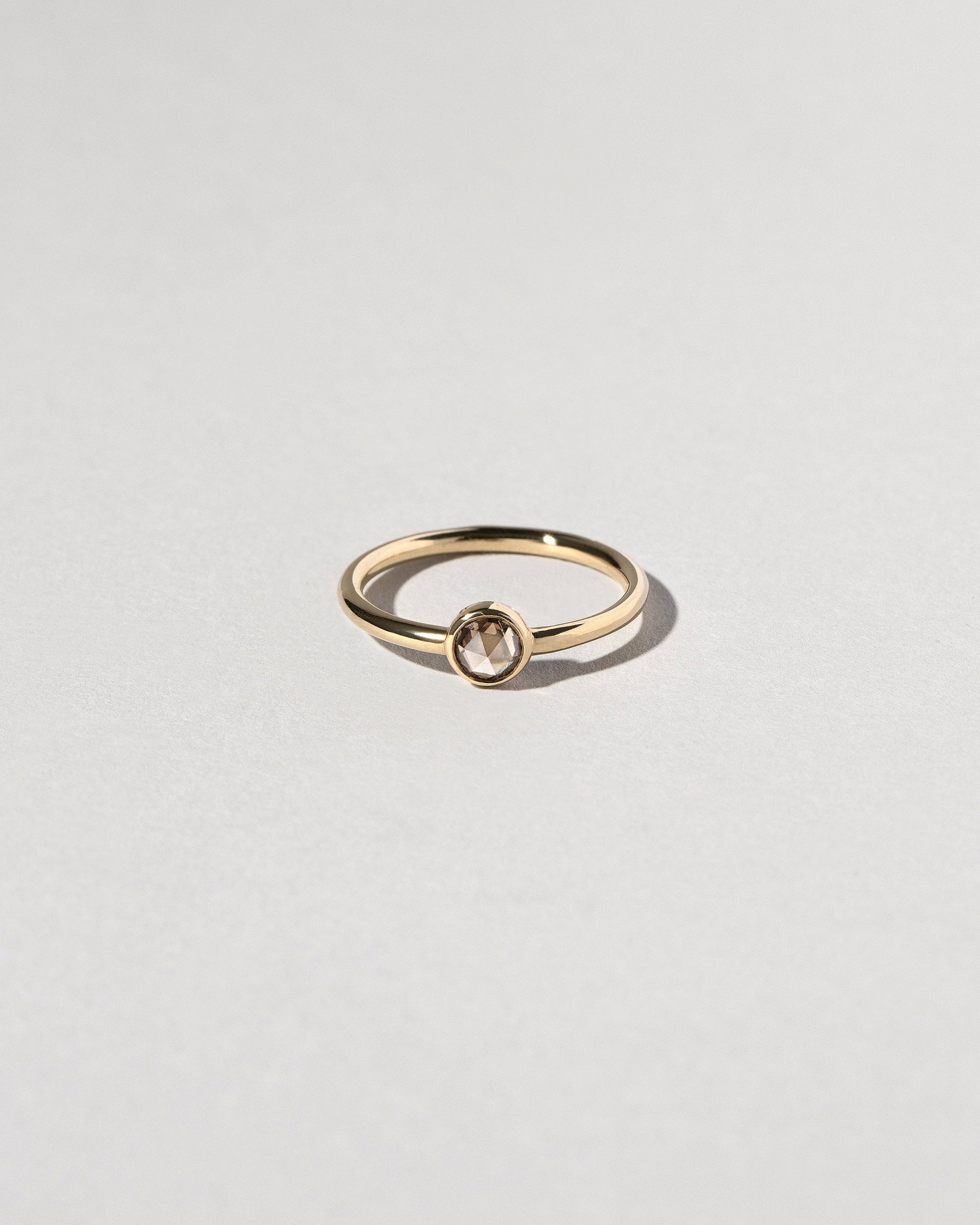  Rose Cut Champagne Diamond Ring on light color background.