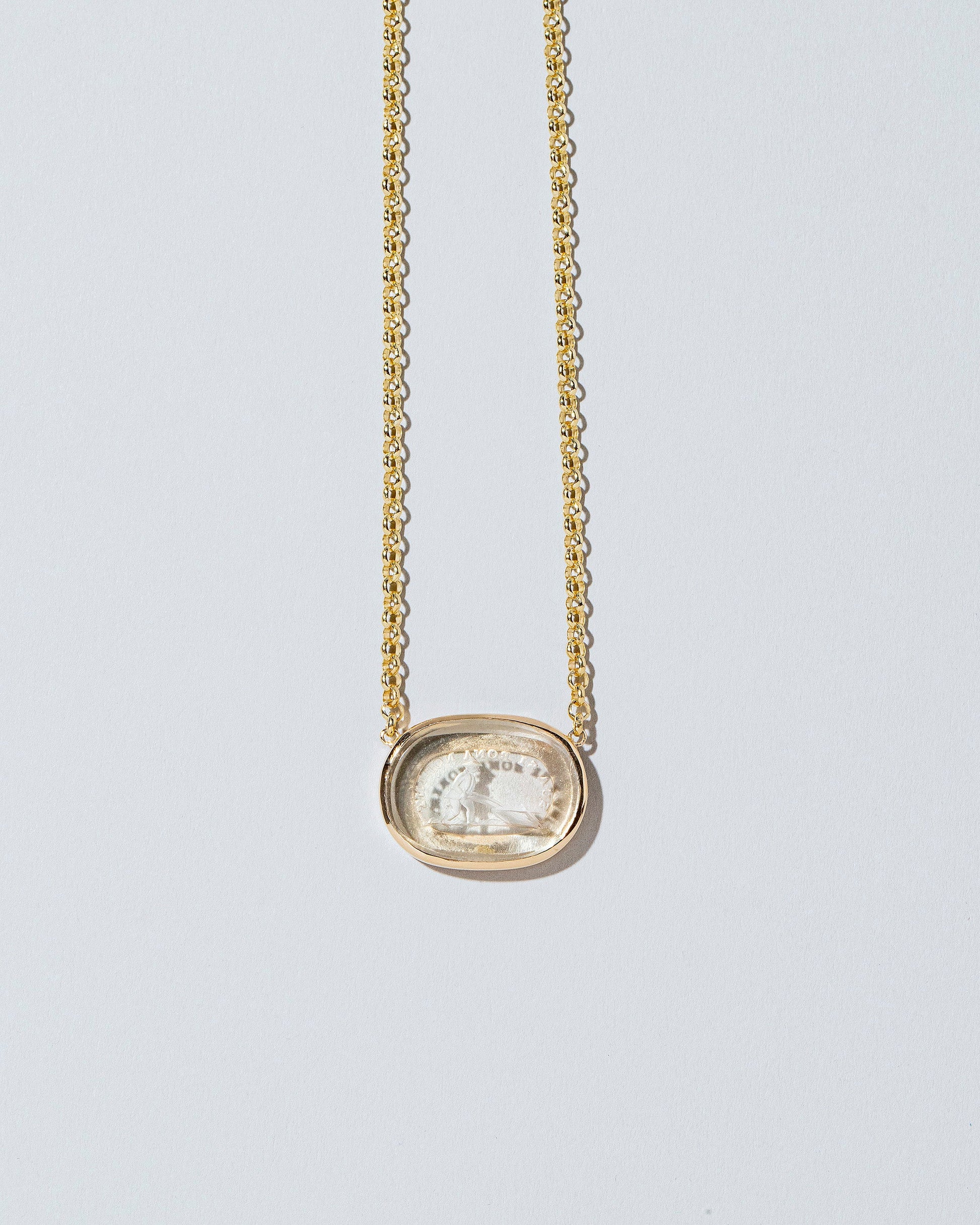  Simplicity Intaglio Seal Necklace on light color background.