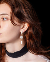 Theseus Earrings on model.