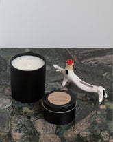 Styled image featuring the Eleonor Boström Black Matchstick Dog.