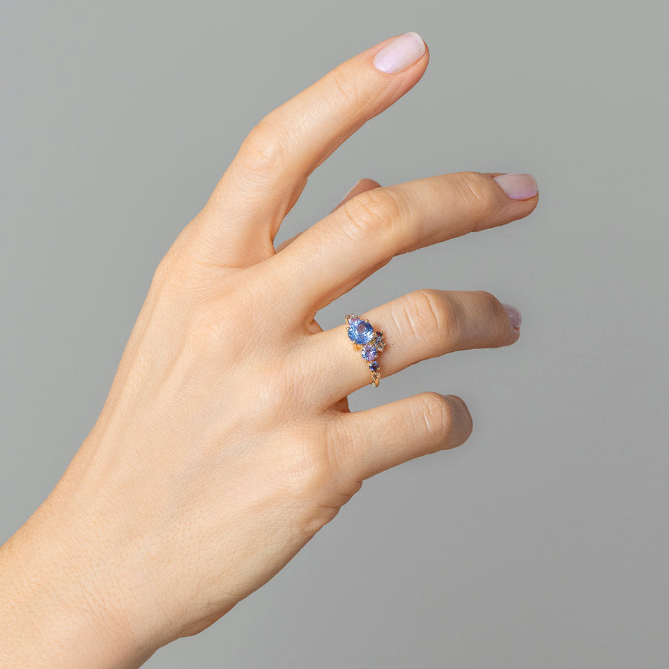 product_details::Luna Ring - Purple & Blue Sapphire on model.