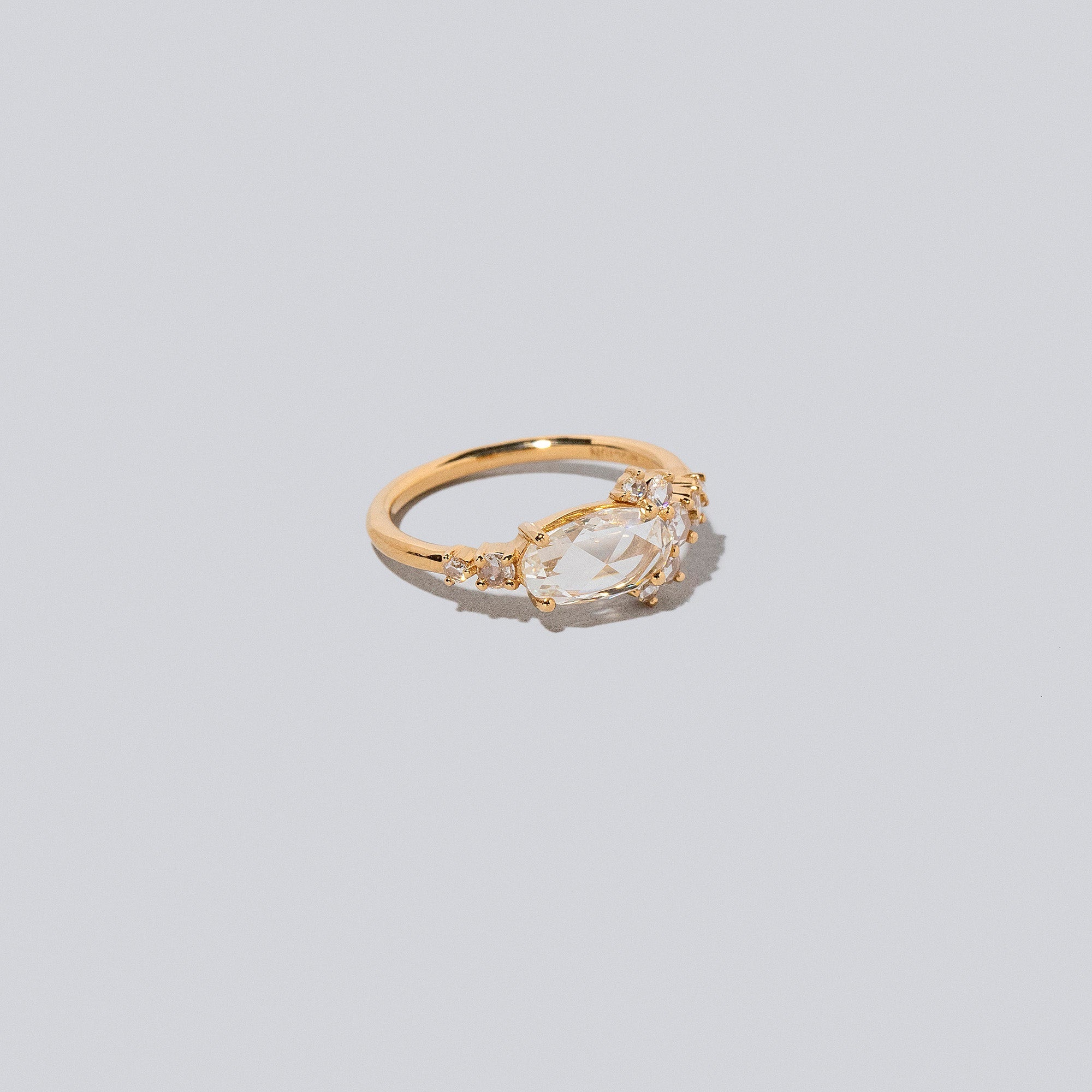 product_details:: Midori Rings on light color background.