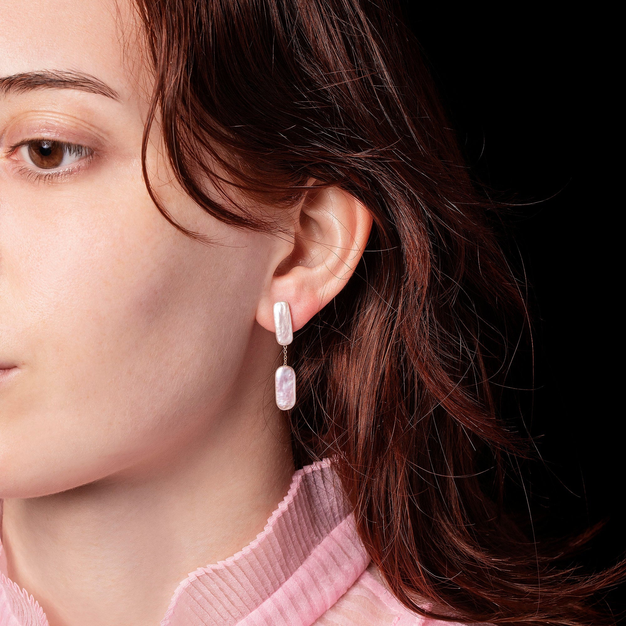 product_details::Neleus Earrings on model.