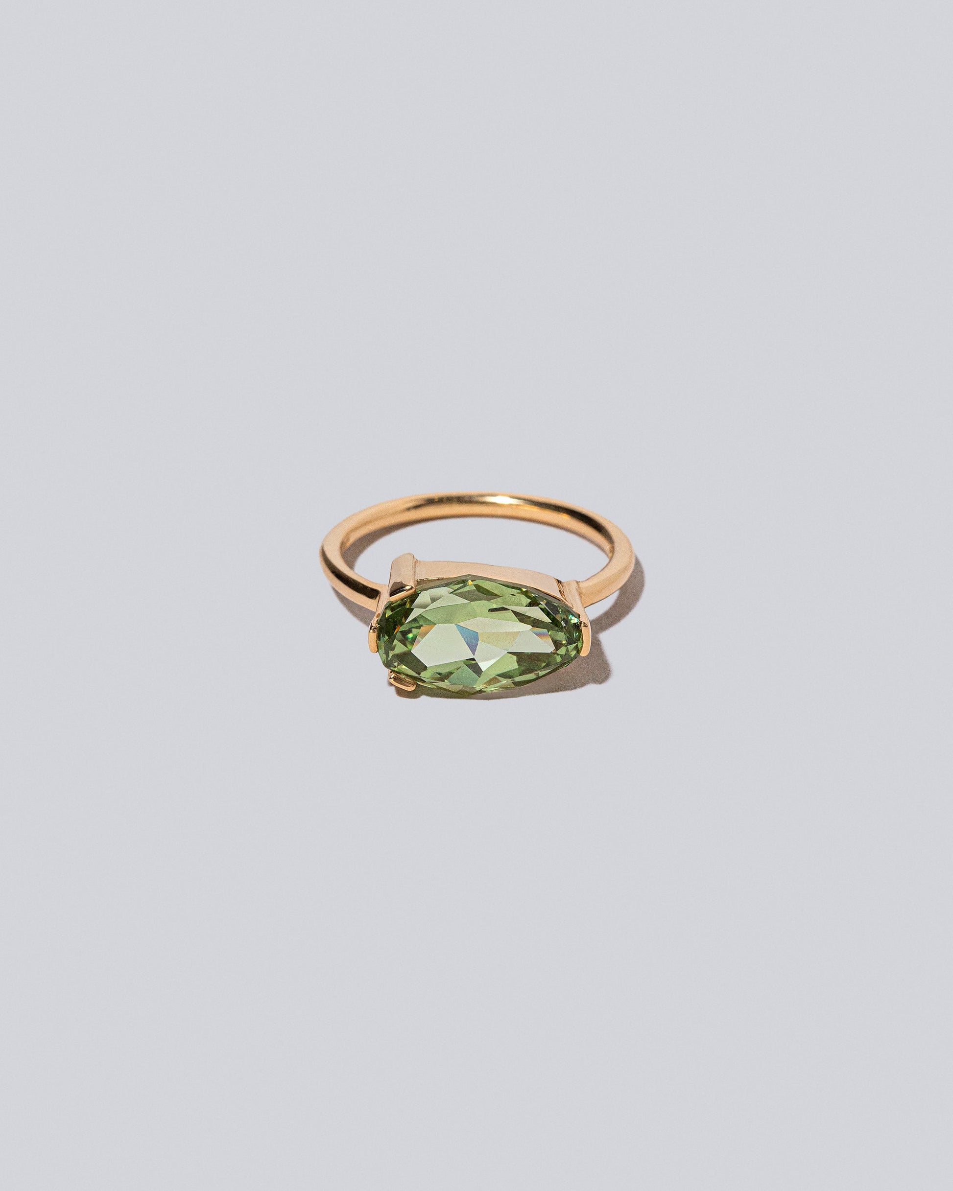 Product photo of the Junco Ring on a light color background 